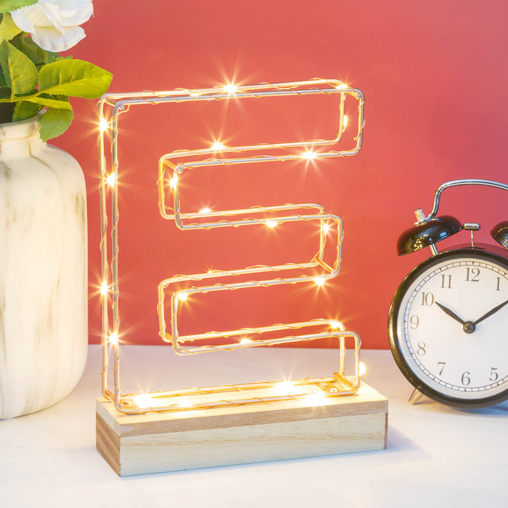 Single Illuminated Copper Rose Gold Wire Frame Letter E LED Light