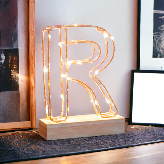 Single Illuminated Copper Rose Gold Wire Frame Letter R LED Light