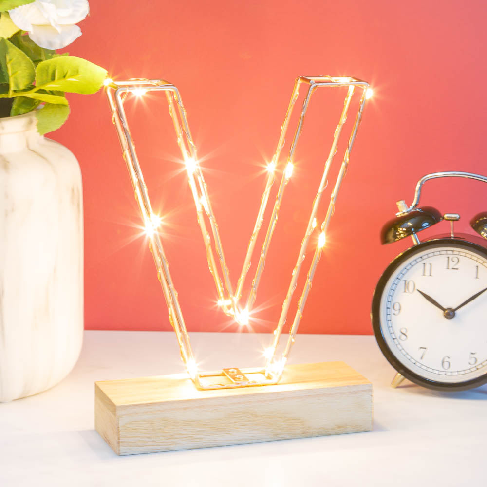 Single Illuminated Copper Rose Gold Wire Frame Letter V LED Light