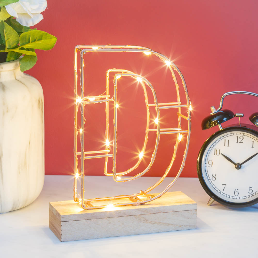 Single Illuminated Copper Rose Gold Wire Frame Letter D LED Light