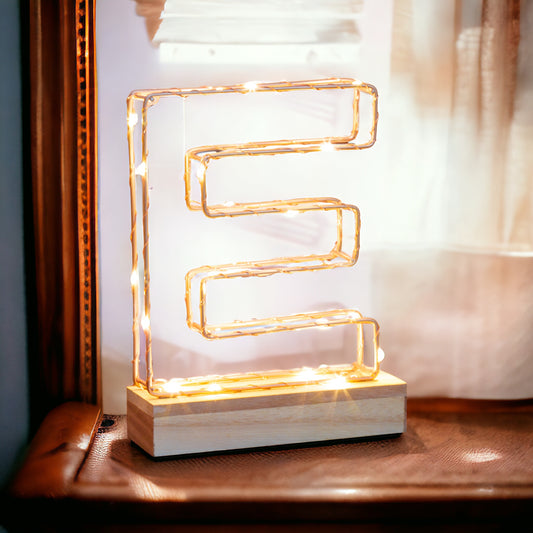 Single Illuminated Copper Rose Gold Wire Frame Letter E LED Light